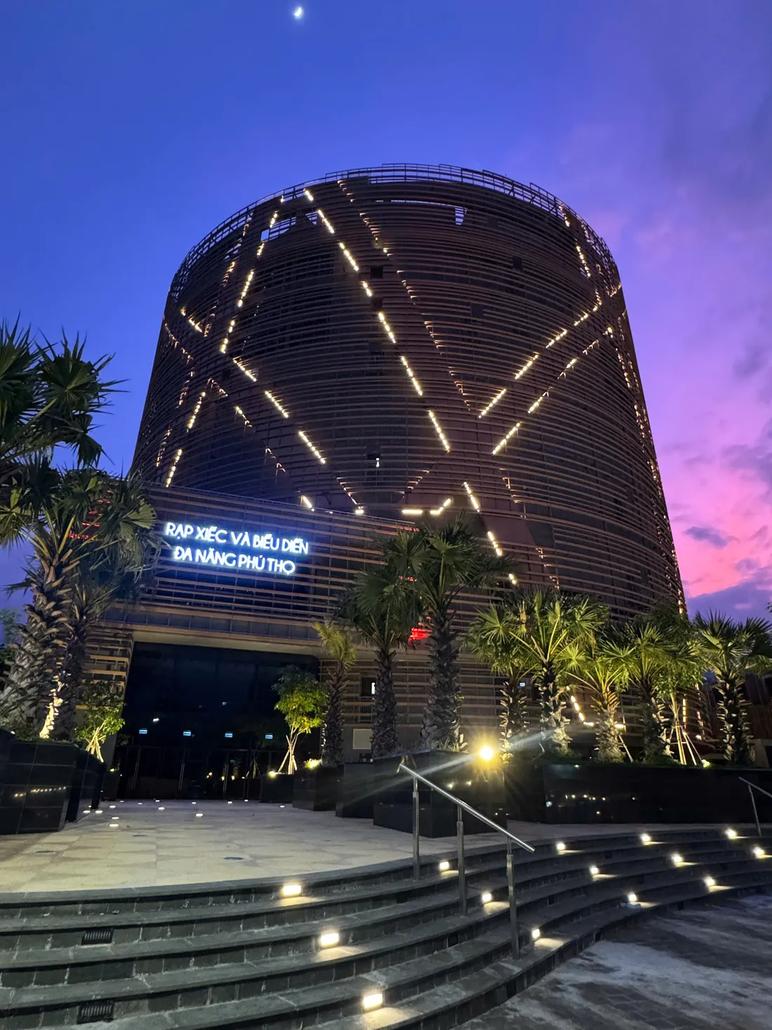 Phú Thọ Circus and Multi-Purpose Performance Hall, façade lit at dusk, District 11 HCMC